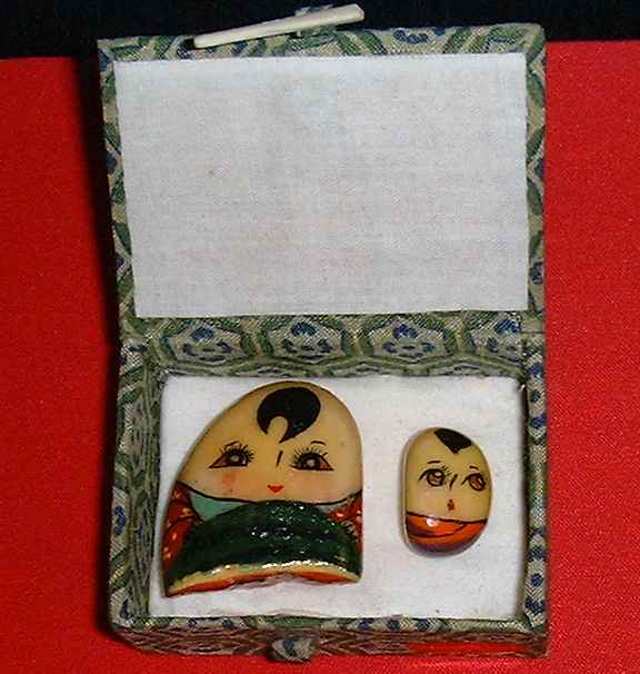 Stone painting: Child eating water melon 